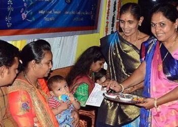 Community-celebrating-parents-girl-child