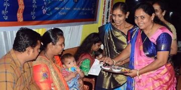 Community-celebrating-parents-girl-child