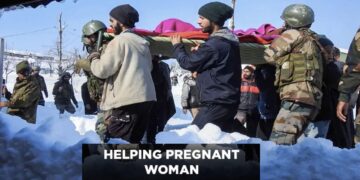 Army-men-helping-pregnant-woman