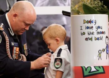 Australian-fire-fighter-toddler-son-accepting-medal-dp