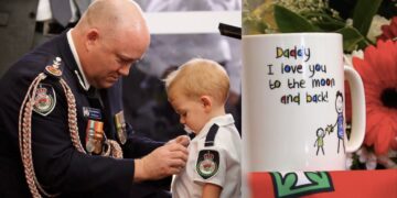 Australian-fire-fighter-toddler-son-accepting-medal-dp
