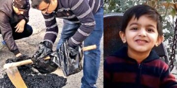 Father-filling-potholes-save-other-kids