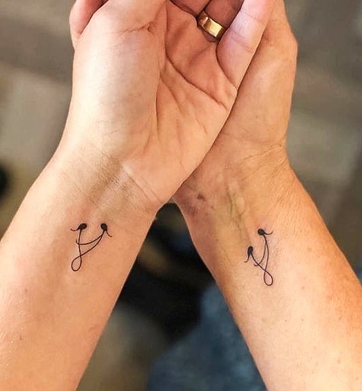 Mother and daughter tattoos