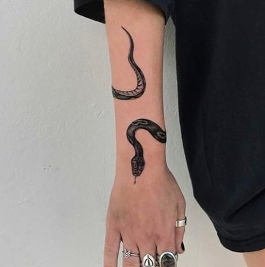 Tattoo designs for the hand and wrist