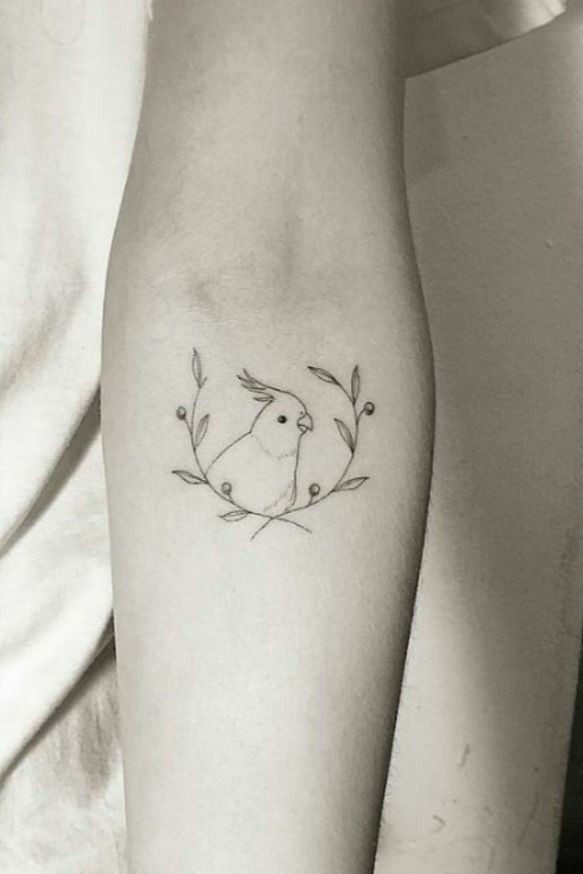 Minimalistic bird tattoo-16