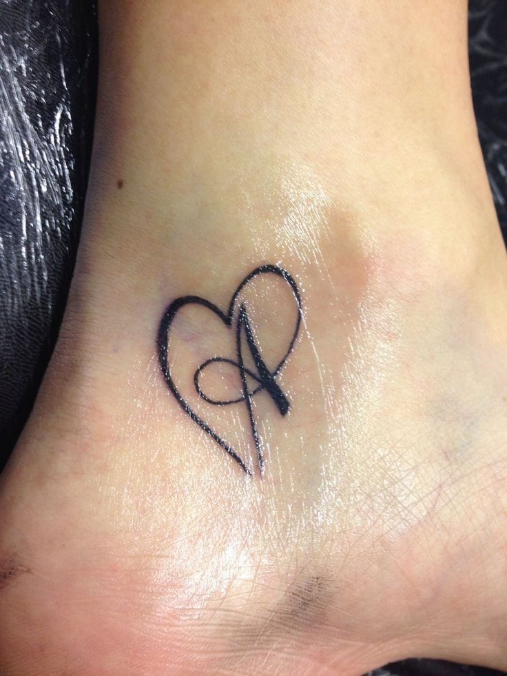 A letter tattoo on leg