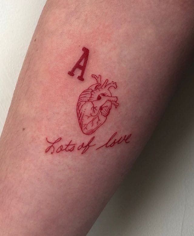 A letter with anatomical heart tattoo