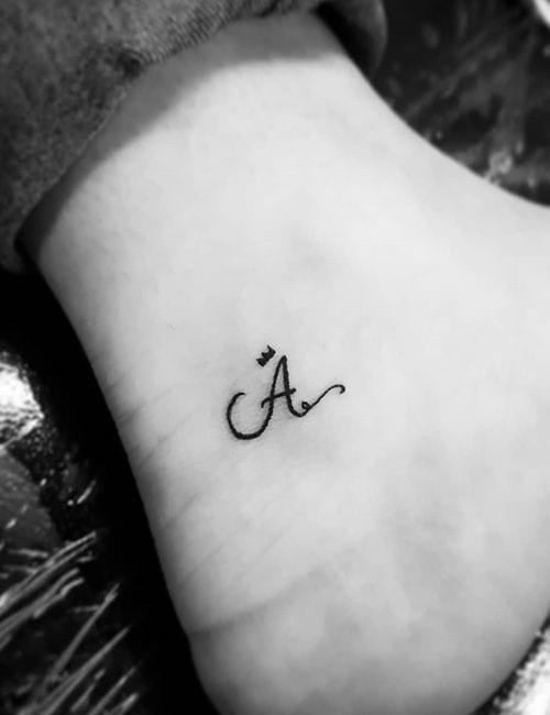 Alphabet A with a Crown tattoo