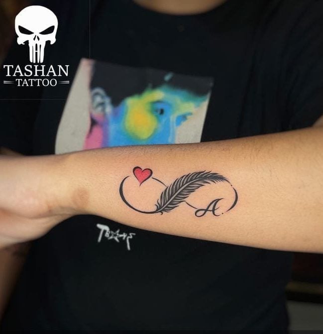 Feather A letter tattoo