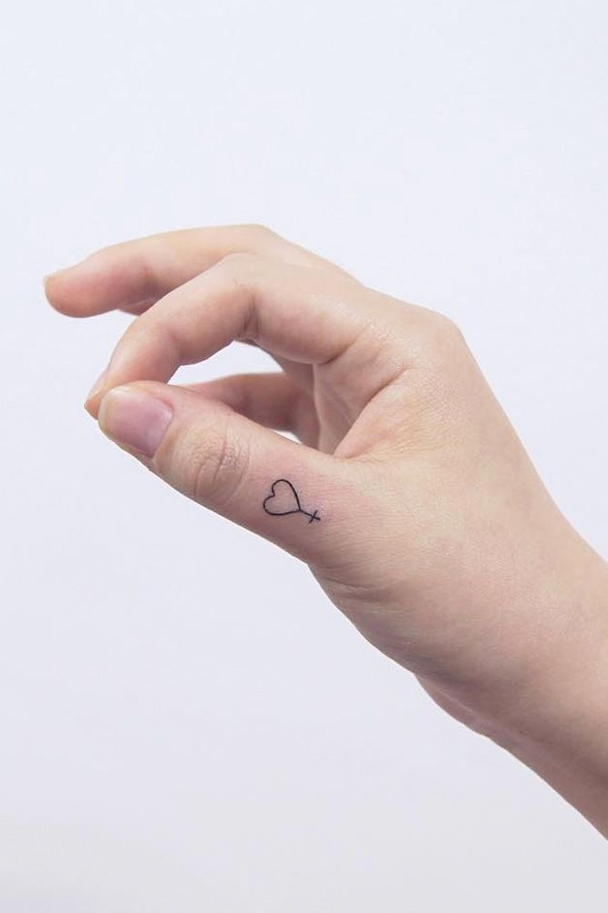 Minimalist Heart Cross Tattoo