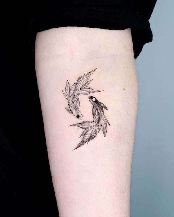 Fish arm tattoo for women