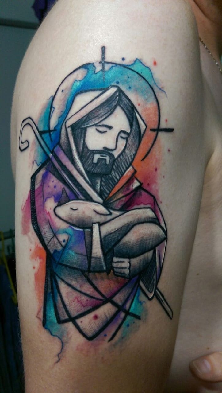 Jesus in a modern or abstract art style tattoo