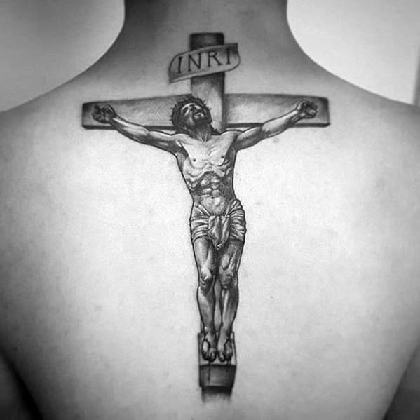 Jesus tattoo on spine