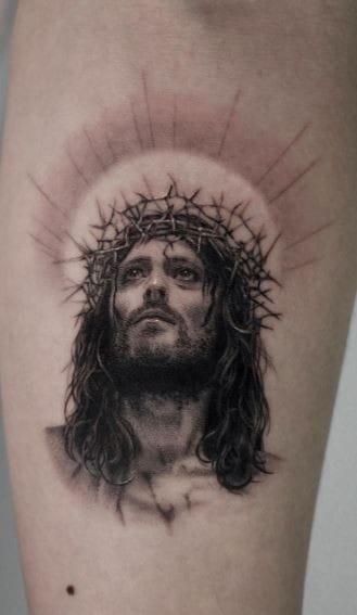 Jesus with a halo tattoo