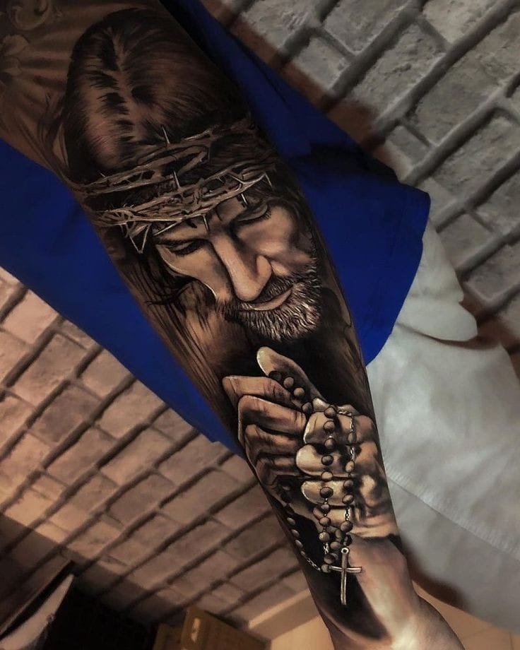 Jesus with a rosary tattoo