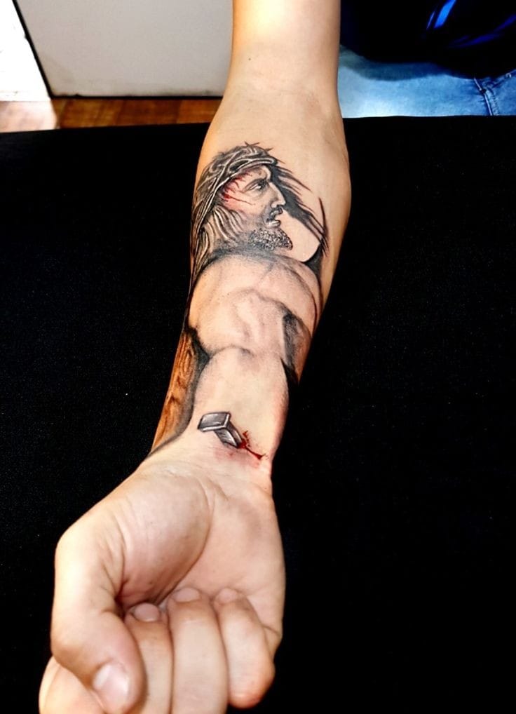Jesus with a tribal design tattoo