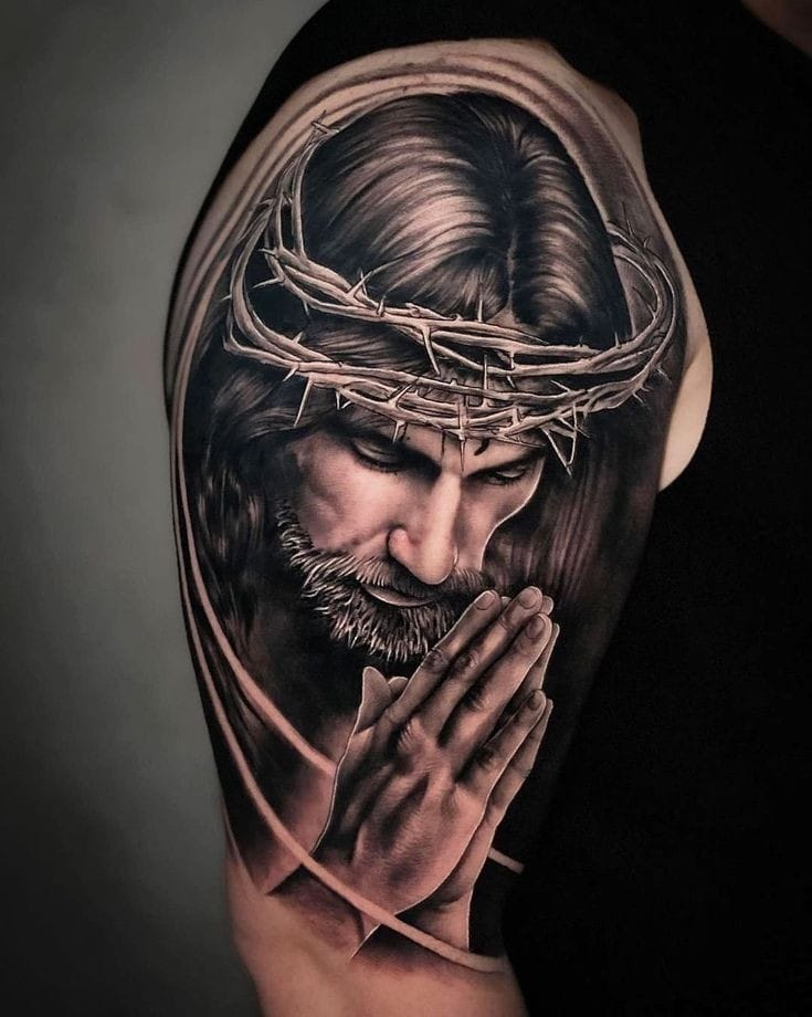 Jesus with praying hands tattoo