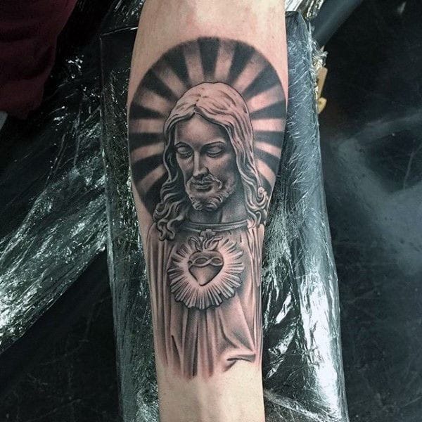 Jesus with sunrise or sunset in the background tattoo