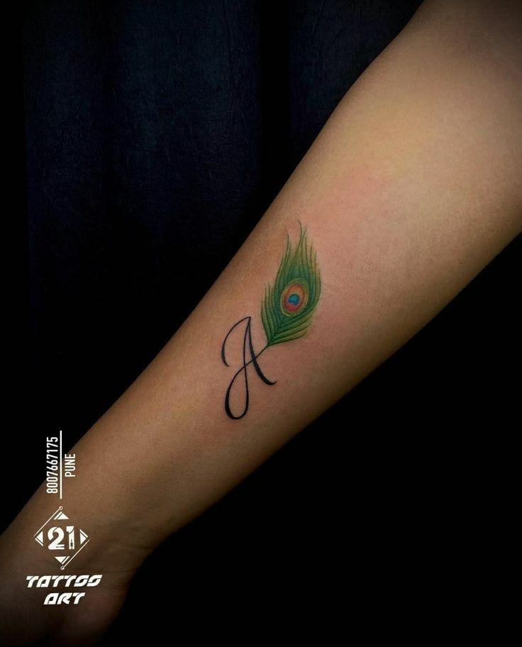 Peacock feather A letter tattoo
