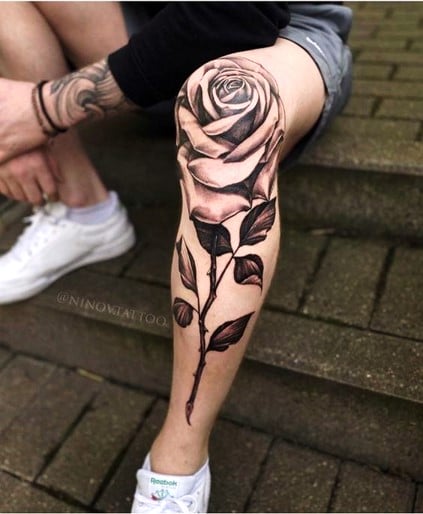 Rose tattoo for men’s leg