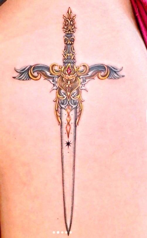 Royal sword tattoo