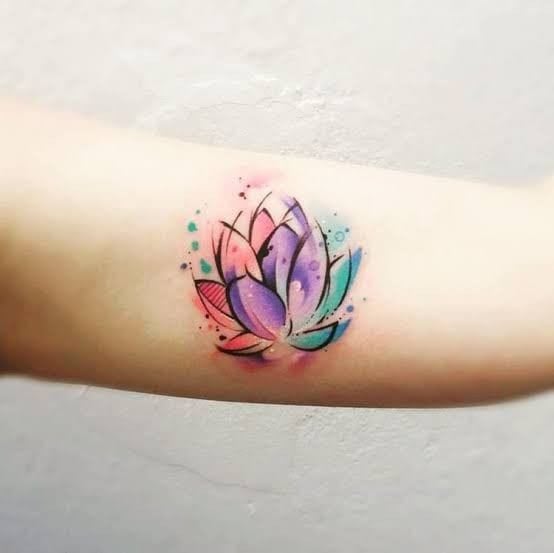 Watercolor lotus tattoo