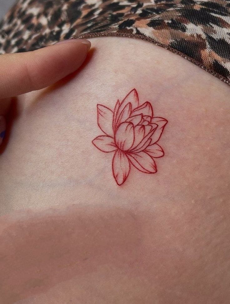cute red ink lotus tattoo