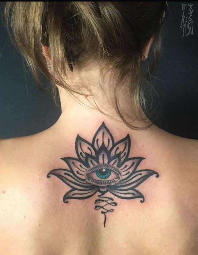 lotus flower with cosmic eye tattoo