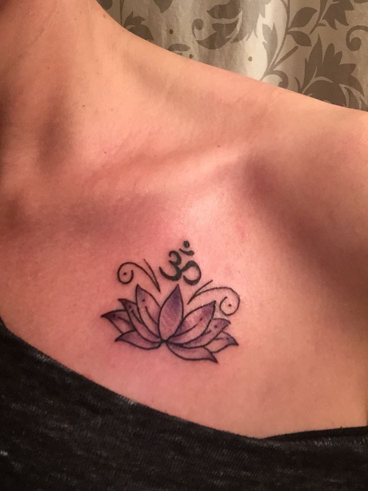 lotus flower with om symbol tattoo