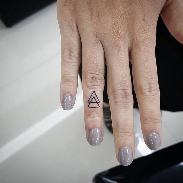 triangle small finger tattoo