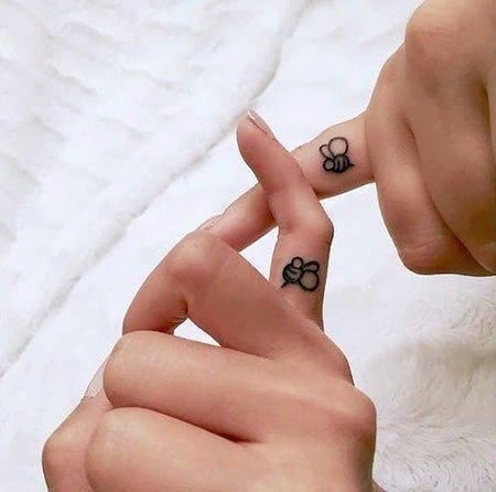 Matching finger bee tattoo-08