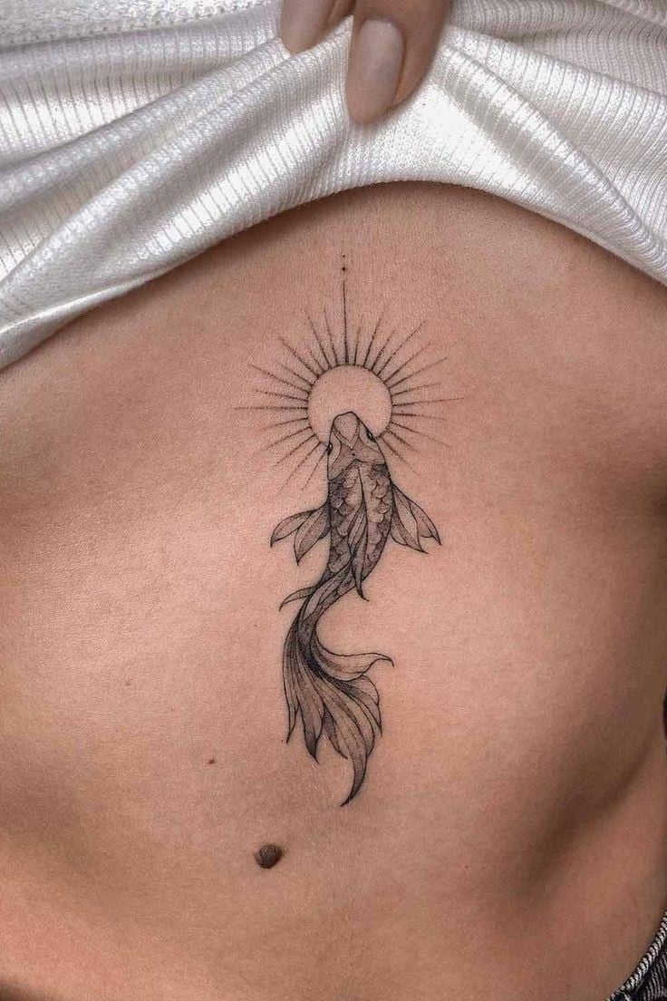 Koi fish with sun tattoo-42