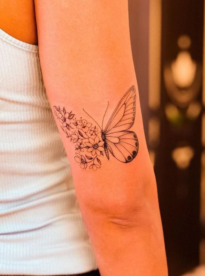 Flower butterfly tattoo