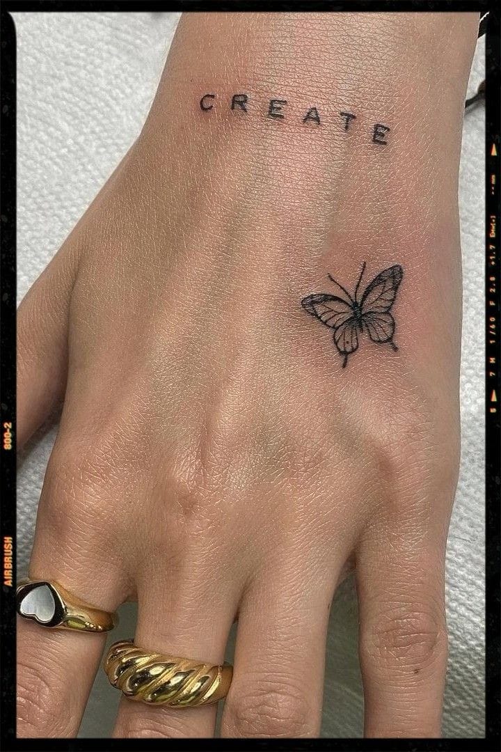 Hand Butterfly Tattoo