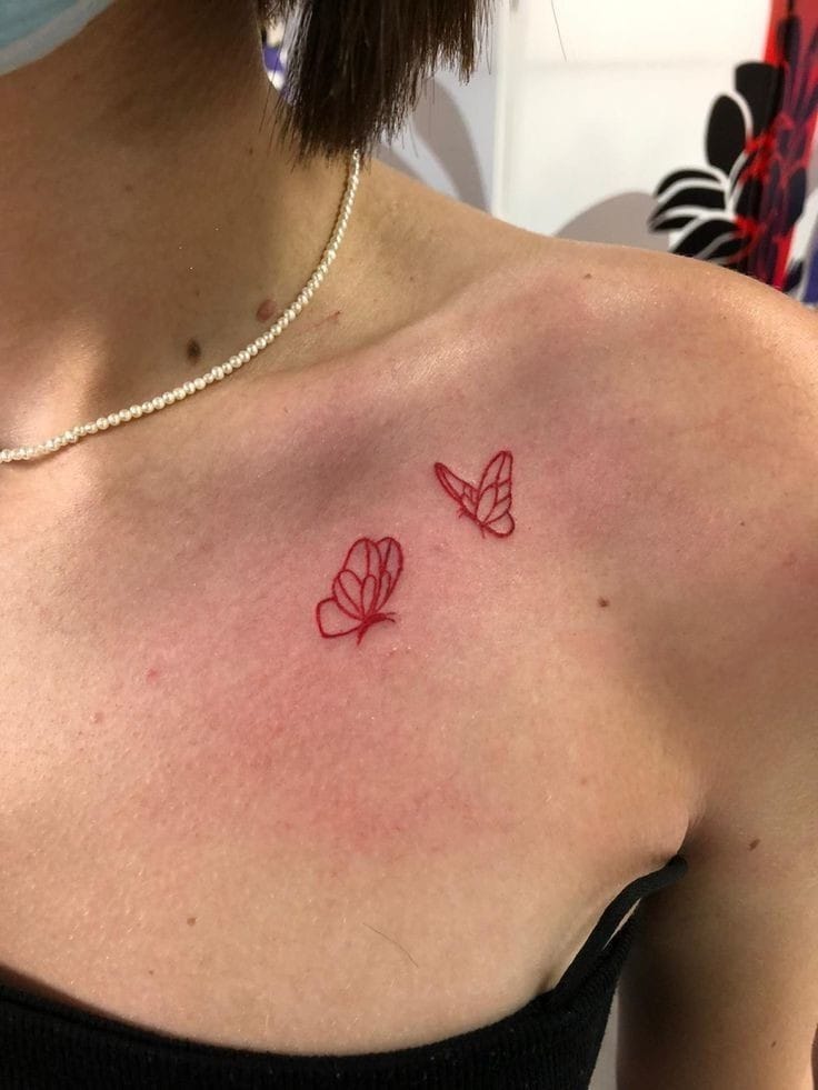 Red butterfly tattoo