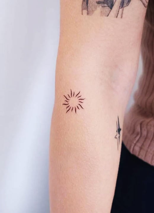 Small Dainty Sun Tattoo