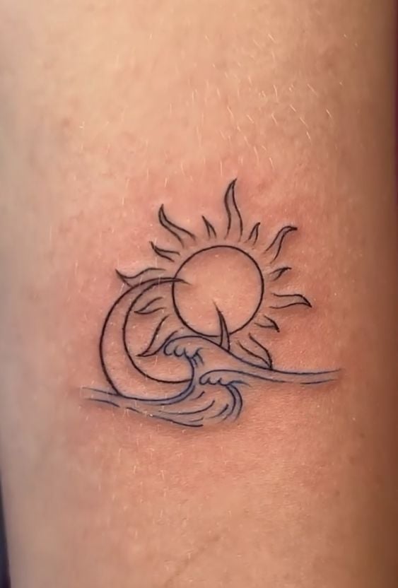 Wave And Sun Tattoo