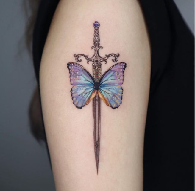 Butterfly sword sleeve tattoo
